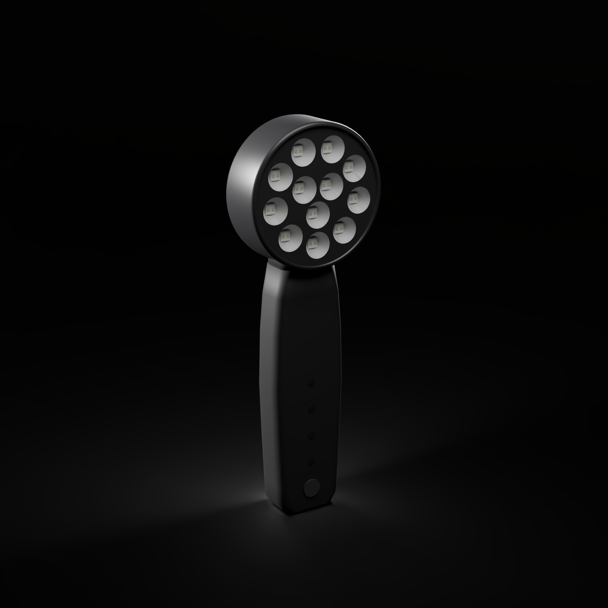 DRKD Retreat 21 with its LEDs off on a dark background, matte black housing with 12 unlit reflector cups in the round head.