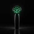 Front view of the DRKD Retreat 21 in a dark room with all 12 LED wells lit green on the black round head.