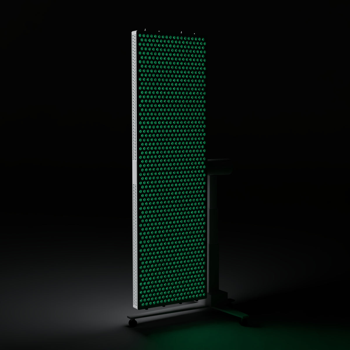 DRKD Retreat 189 in a dark room at a three-quarter angle with its LED array lit green, white housing on the MS2000-B iron column stand.