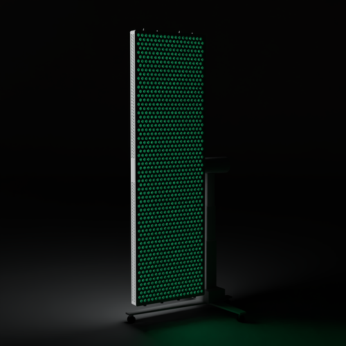 DRKD Retreat 189 in a dark room at a three-quarter angle with its LED array lit green, white housing on the MS2000-B iron column stand.