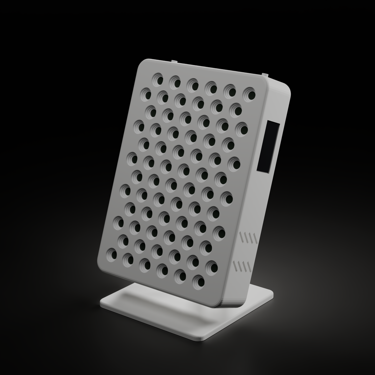 DRKD Retreat 32 with its LEDs off on a dark background, three-quarter view of the white housing, hinged arm and square base.