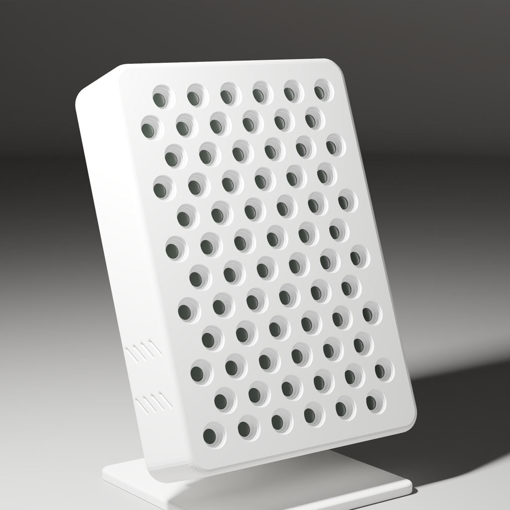 DRKD Retreat 32 with its LEDs off under a hard key light, three-quarter view showing the white housing edge, side vents and base plate.