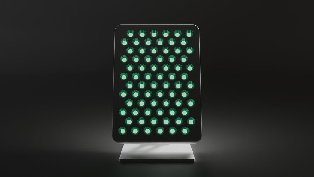 360-degree turntable of the DRKD Retreat 32 with its green LEDs lit, showing the front array, side profile, rear panel and stand.